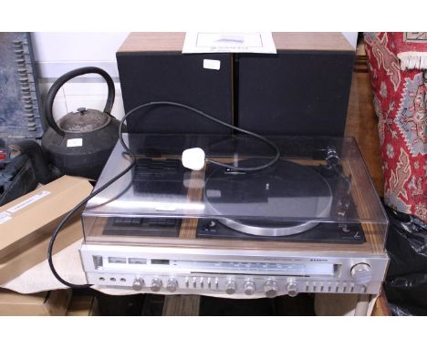 A vintage Sanyo music centre in working order. Shipping unavailable 