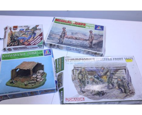 Four assorted military model kits, (boxed as new) 