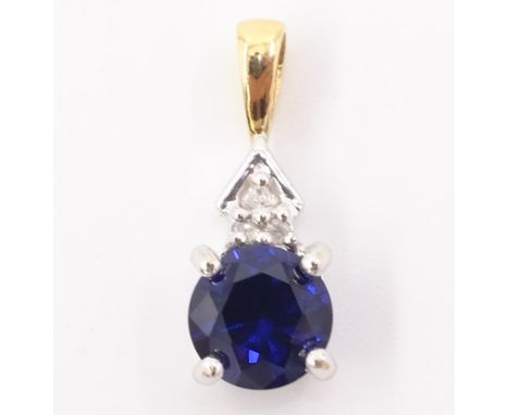 9ct gold blue sapphire and diamond pendant stamped 375   Condition Report  Length = 1.5cm  Click here for further images, con