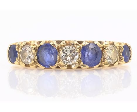 Seven stone sapphire and diamond ring hallmarked 9ct   Condition Report  approx 2.3gm size N-O Click here for further images,