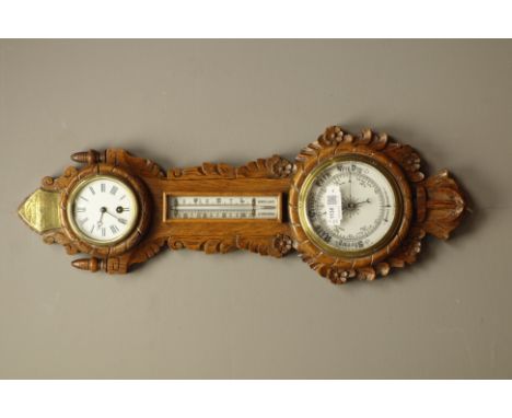 Early 20th century oak aneroid barometer with enamel dial clock and mercury thermometer, carved with scrolls, flower head and