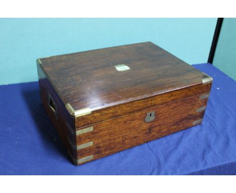 A fine Victorian oak 'Campaign' lockable box retailed by Army &amp; Navy C.S.L., 17 3/4" x 13 1/2" x 6 3/4", with key