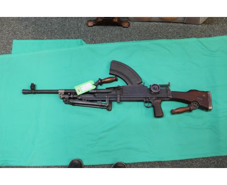 A .303 MkI Bren light machine gun by Inglis Canada dated 1942, with transit case dated 1943 containing two spare magazines, p