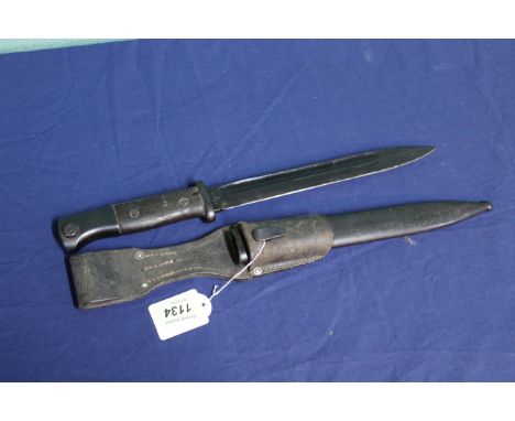 A German Third Reich era K98 bayonet with scabbard and correct leather frog (bayonet marked J.Sch)