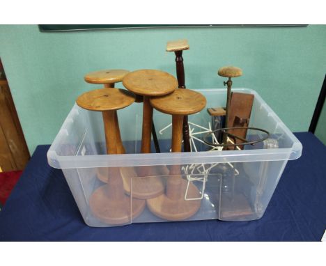 A box containing hat display stands, two vintage examples with other stands