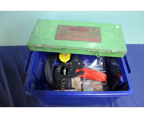 A vintage Parker Hale cleaning kit tin (some contents) with two 'pull up' air gun targets