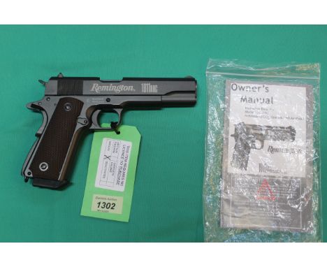 A Remington 1911 RAC CO2 .177 cal air pistol, in as new condition with case and owners manual, as a post 1939 air weapon the 
