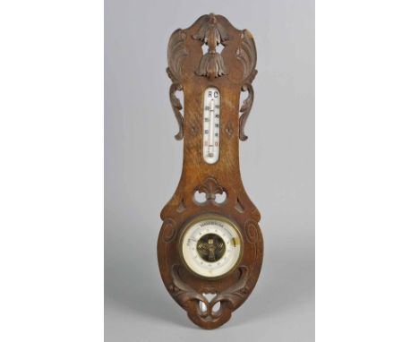 Jugendstil Thermo-/Barometer um 1900 dunkles Eichenholz, geschweifte Form mit geschnitzten Jugendstil Blattapplikation, funkt