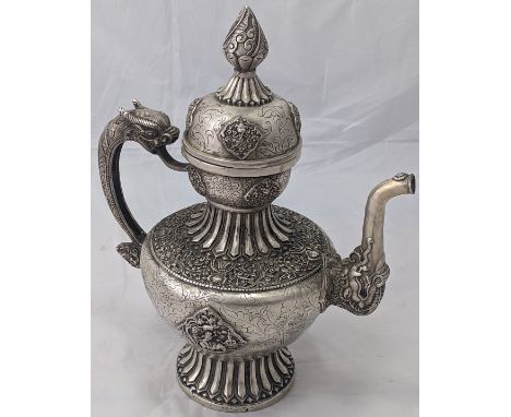 A large Tibetan or Himalayan white metal teapot, Tibet or Himalayan India, H.37cm