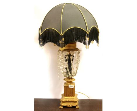 A large French ormolu mounted figural table lamp and shade, H. 79cm.