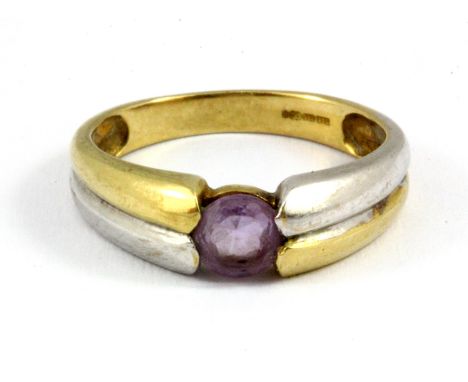 A 9ct yellow and white gold amethyst set ring, (N.5).