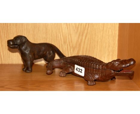 A cast iron crocodile box, L. 25cm and a cast iron dog nutcracker.