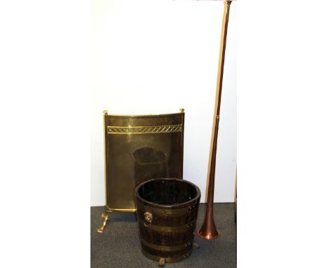 A brass fire screen, brass bound oak barrel planter and a hunting horn.