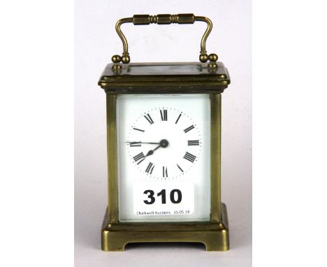 A gilt brass carriage clock, H. 14cm.