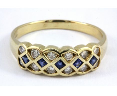 A 14ct yellow gold (stamped 14k) sapphire and diamond set ring, (R).