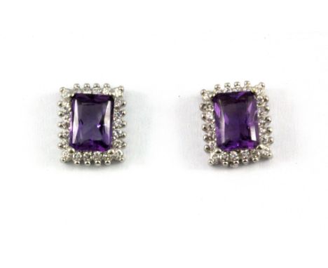 A pair of 925 silver amethyst and white stone set cluster earrings, L. 1.2cm.