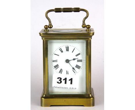 A gilt brass carriage clock, H. 14cm.