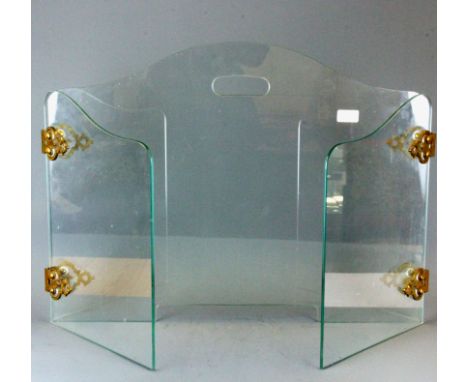 A glass and gilt metal folding fire screen, H. 52cm main panel W. 68cm.