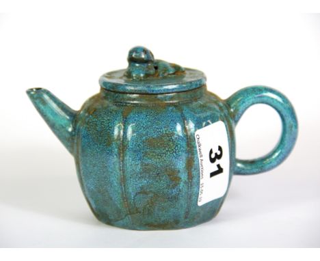 A small Chinese robin's egg glazed terracotta teapot, H. 8.5cm.