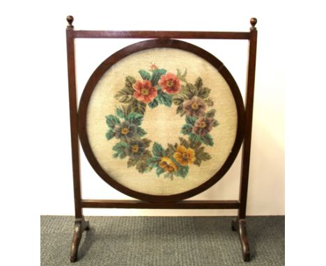 A 1930's mahogany and glass beadwork fire screen, H. 77cm.
