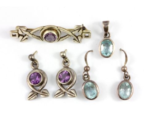 A pair of 925 silver amethyst set drop earrings and matching brooch, together with a pair of 925 silver blue topaz set earrin