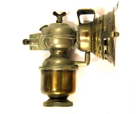 An early carbide bicycle lamp, H. 17cm.