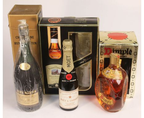 A small quantity of alcoholic beverages comprising a Remy Martin Champagne Cognac, Famous Grouse 12 Year Gold Reserve 100 Yea