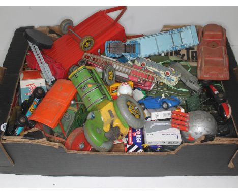 A box of vintage toys including tinplate, Lesney, Dinky etc.  