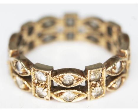 A 9ct gold eternity band set with colourless stones, marked '9c', gross wt. 3.3g, size M/N.  