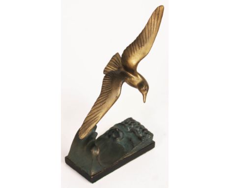 An Art Deco patinated spelter figure depicting a flying seagull and waves, signed 'Caillard', height 22cm.  Condition: only m