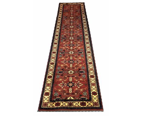 AFGHAN PEREPIDIL DESIGN RUNNER, 347cm x 89cm, stylised organic motif field within complimentary borders.
