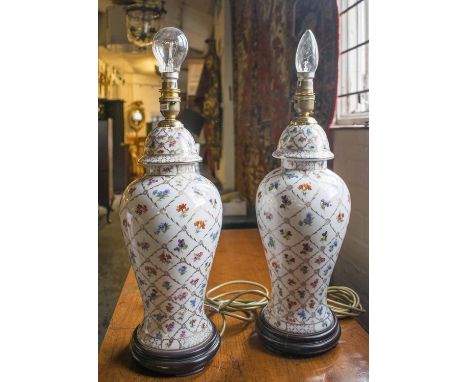 LAMPS, a pair, Chinese ceramic Ginger Jar form, gilt foliate decoration, with shades, 64cm H. (2)