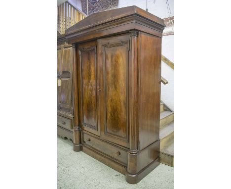 WARDROBE, Victorian flame mahogany the architectural cornice above two panelled doors enclosing double hanging with pillars a