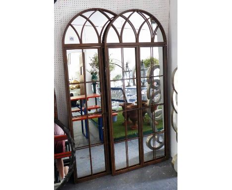 GARDEN MIRRORS, a pair, architectural style with domed top in a rustic effect metal frame, 179cm x 75cm. (2)