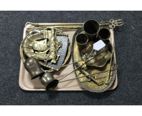 A tray of brass, crocodile nut cracker, candlesticks etc 