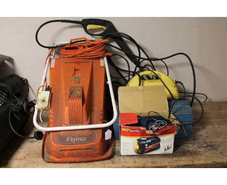 A Flymo mower, Karcher pressure washer and a metal tool box of tools 