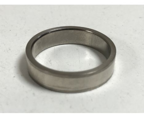 A Titanium wedding band, size W