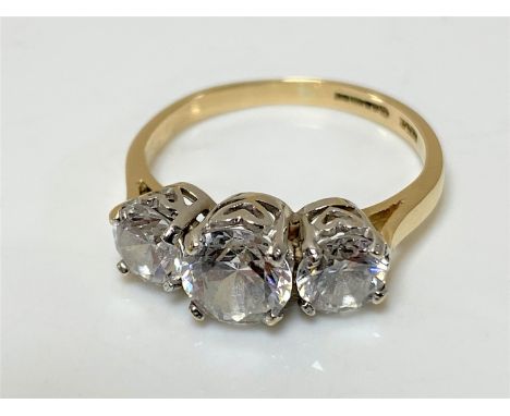 A 14ct gold three stone ring, size O