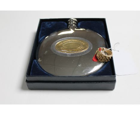 A 9ct gold dress ring and a silver plated hip flask 