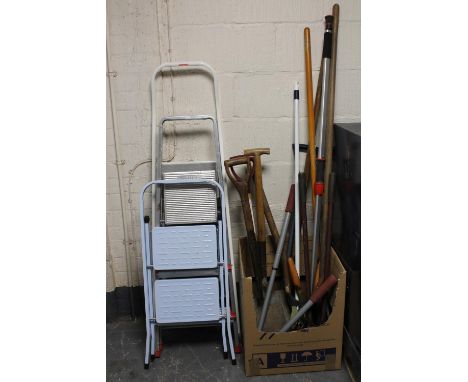 A quantity of garden tools and three pairs of steps 