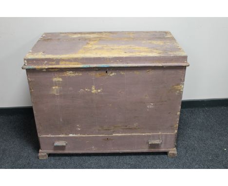 A 19th century pine trunk fitted with a drawer  