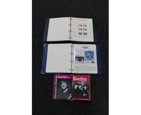 Three albums of collector's stamps, first day covers and volumes of The Beatles monthly magazine 