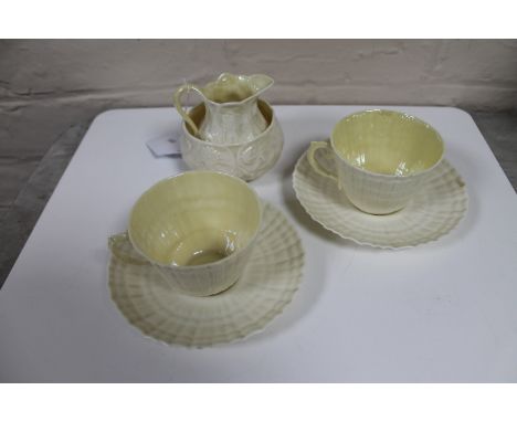 Six items Belleek china : milk jug, sugar basin, cups and saucers 