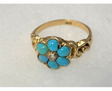 An 18ct gold turquoise and diamond ring 