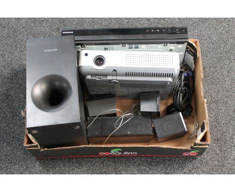 A box of Sanyo projector, Samsung DVD player, speaker surrounds etc 