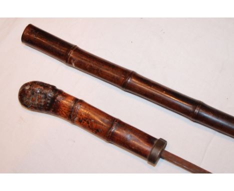 An old Japanese sword-stick with 17½" square section blade in natural bamboo mounts 