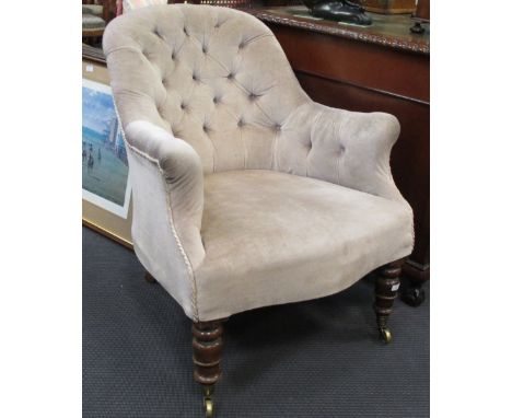 A Victorian mahogany grey upholstered button back armchair  