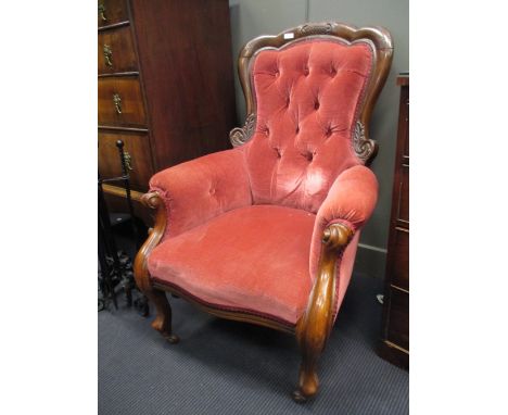 A Victorian mahogany button back armchair, together with a rocking chair (2)  