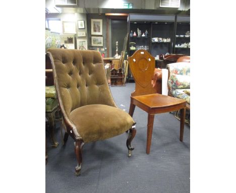 A Victorian mahogany hall chair, and an early Victorian button back easy chair (2)  