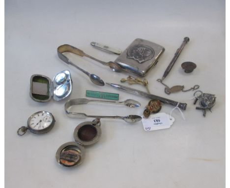 A silver cigarette case and various other items  